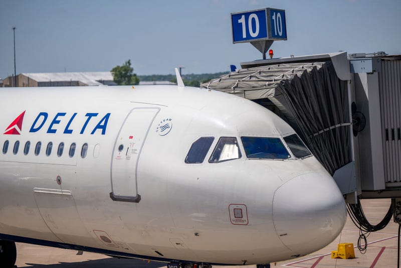 A Delta Air lines is seen at its terminal at the Austin-Bergstrom International Airport on April 13, 2023 in Austin, Texas. 