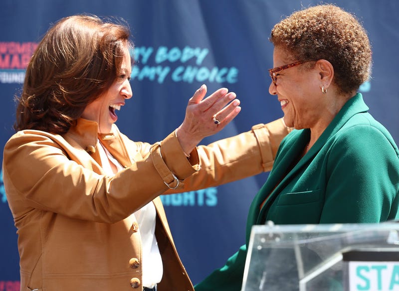 U.S. Vice President Kamala Harris (L) prepares to embrace Los Angeles Mayor Karen Bass during a surprise appearance at the March for Reproductive Rights organized by Women’s March L.A. on April 15, 2023 in Los Angeles, California.