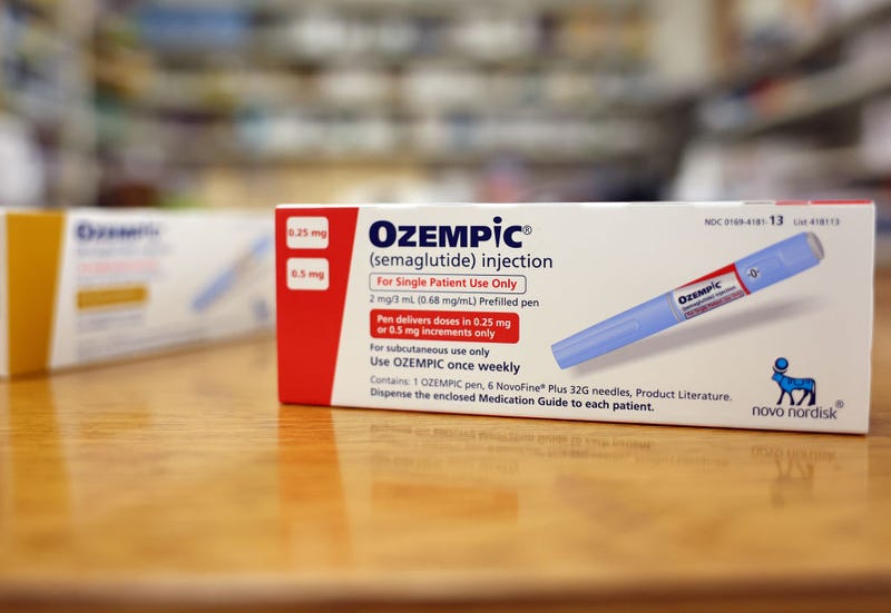 In this photo illustration, boxes of the diabetes drug Ozempic rest on a pharmacy counter on April 17, 2023 in Los Angeles, California.