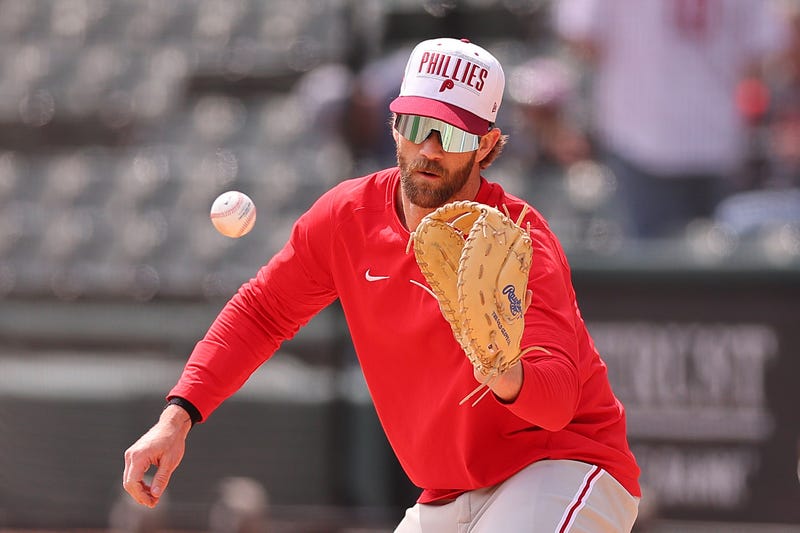 Bryce Harper #3 of the Philadelphia Phillies takes infield at first base prior to the game