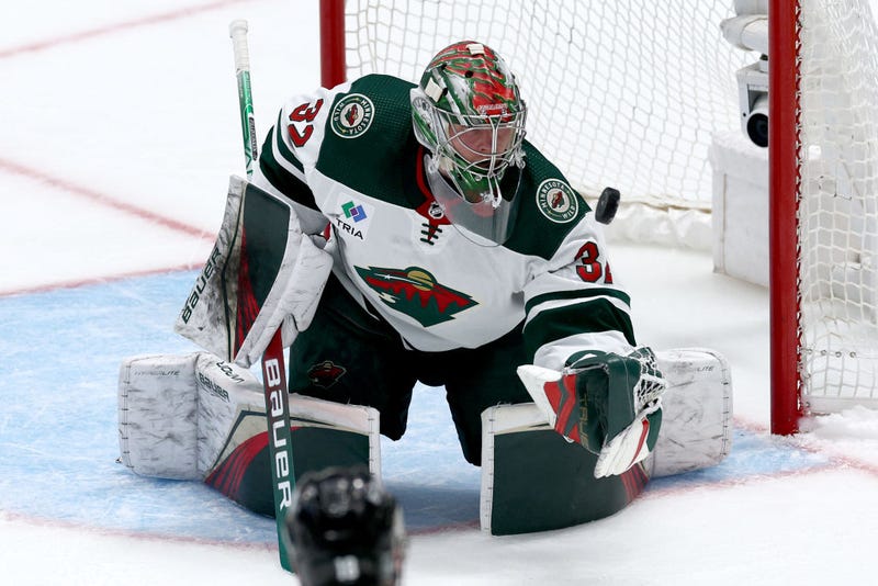 Filip Gustavsson #32 of the Minnesota Wild blocks a shot on goal against the Dallas Stars in the first overtime period in Game One of the First Round of the 2023 Stanley Cup Playoffs at American Airlines Center on April 17, 2023 in Dallas, Texas. 