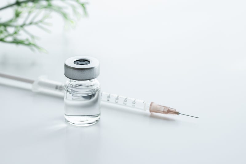 Syringe and fluid for injection.