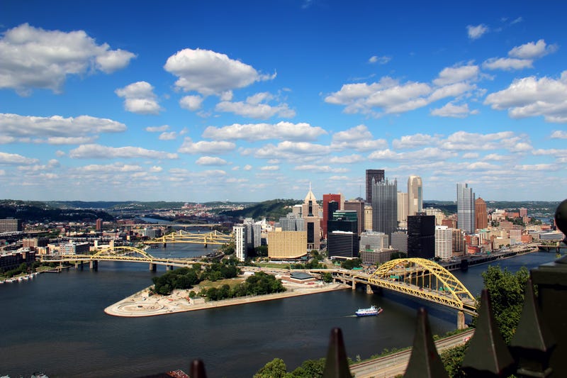 Dramatic shot of a summer day over Pittsburgh, PA. As seen from Mount Washington. Corporate logos digitally removed for general usage.