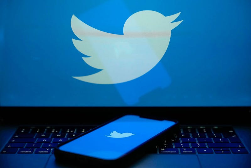 In this photo illustration the Twitter logo is seen on a computer screen and mobile cellphone on April 21, 2023 in Knutsford, United Kingdom. 