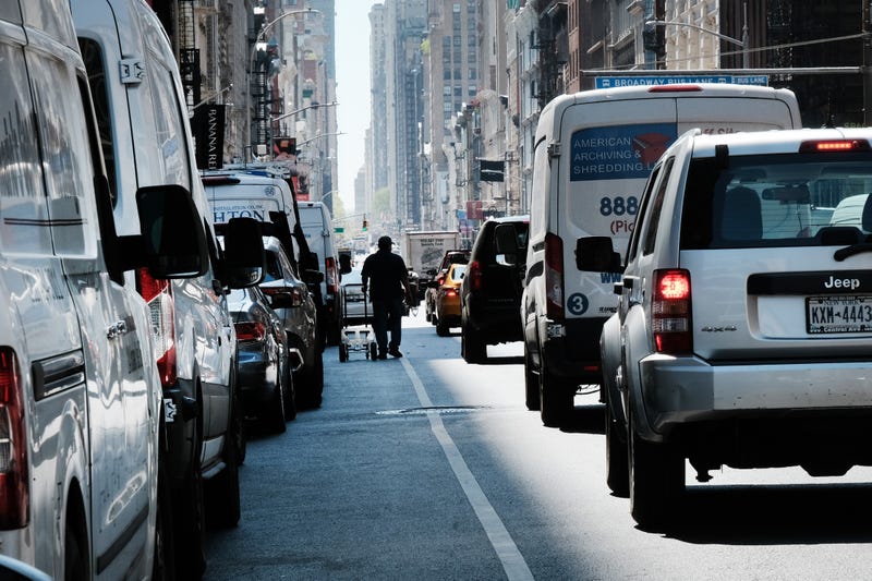 Traffic moves through Manhattan on April 21, 2023