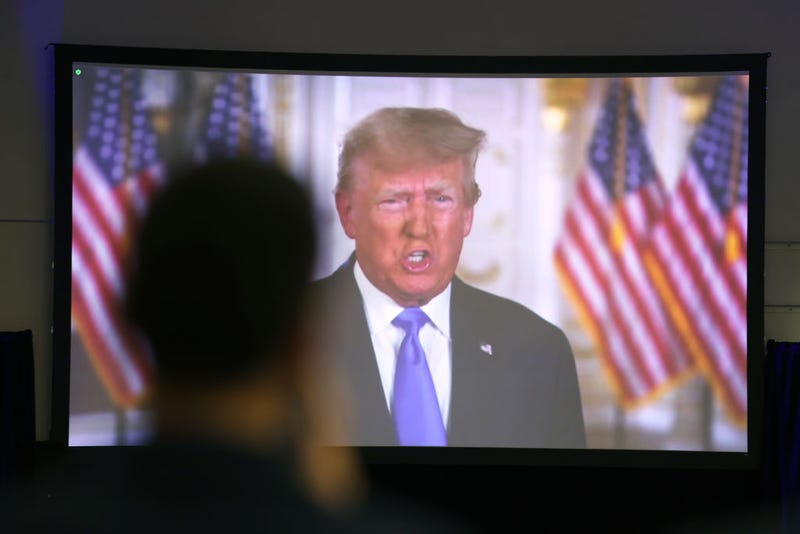 Former President Donald Trump speaks to guests via video link at the Iowa Faith & Freedom Coalition Spring Kick-Off on April 22, 2023 in Clive, Iowa. Iowa is scheduled to hold the first Republican presidential nominating contest of 2024, on Feb. 5. (Photo by Scott Olson/Getty Images)