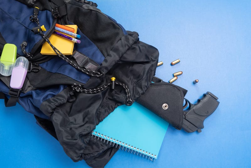 Gun in backpack