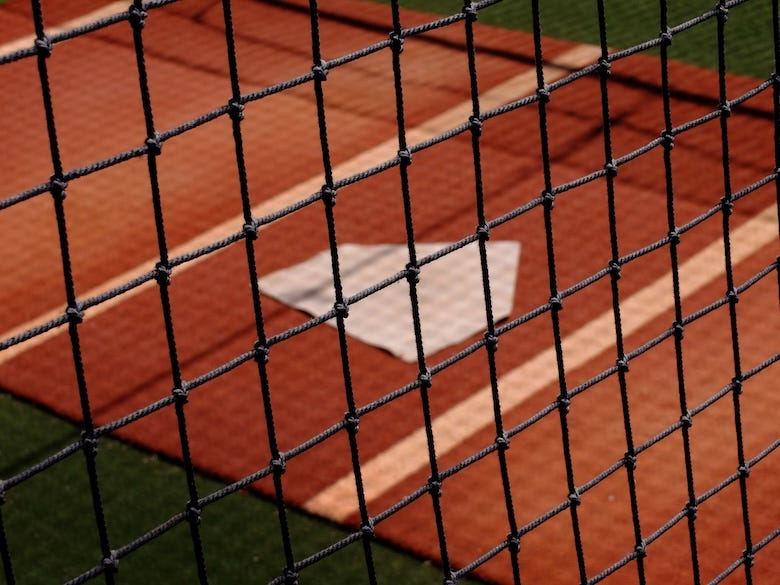 Baseball home plate in a batting cage
