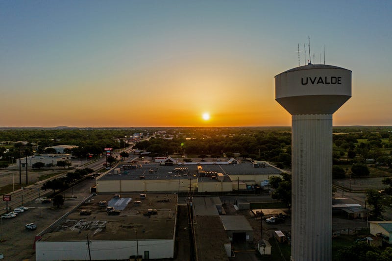 In an aerial view, the town of Uvalde is seen at sunrise on April 27, 2023, in Uvalde, Texas. The town of Uvalde prepares to mark the 1-year anniversary of the 19 children and two adults murdered during last year's mass shooting at Robb Elementary School.