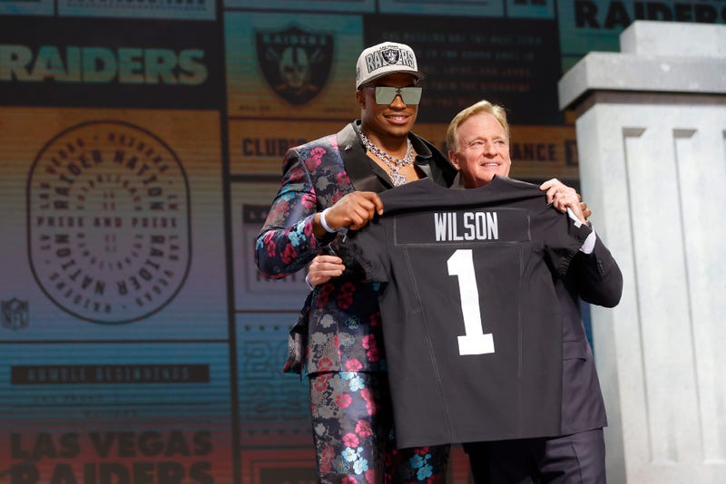 Tyree Wilson poses with NFL Commissioner Roger Goodell after being selected seventh overall by the Las Vegas Raiders during the first round of the 2023 NFL Draft