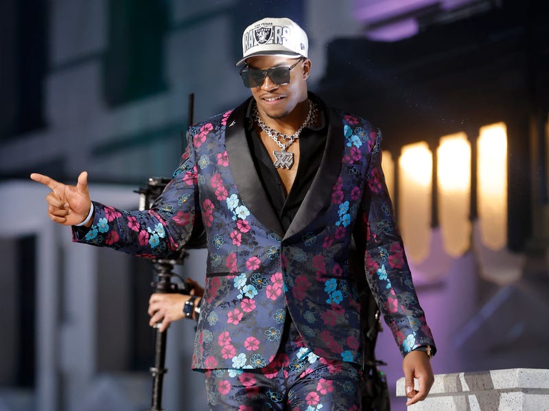 Tyree Wilson walks on stage after being selected seventh overall by the Las Vegas Raiders during the first round of the 2023 NFL Draft at Union Station on April 27, 2023 in Kansas City, Missouri.