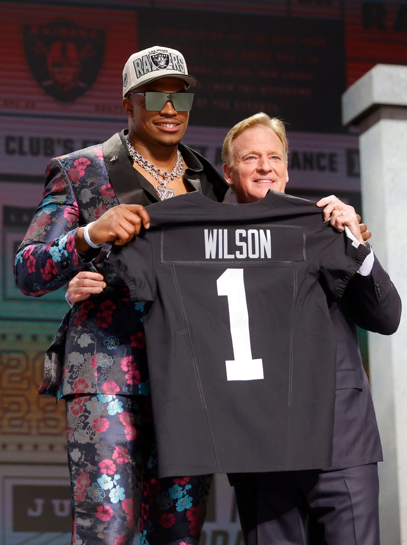 ) Tyree Wilson poses with NFL Commissioner Roger Goodell after being selected seventh overall by the Las Vegas Raiders during the first round of the 2023 NFL Draft