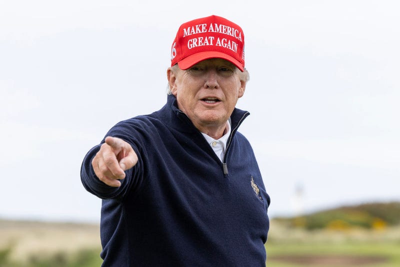 (EDITOR'S NOTE: Alternative crop of image #1252535245) Former U.S. President Donald Trump gestures during a round of golf at his Turnberry course on May 2, 2023 in Turnberry, Scotland. Former U.S. President Donald Trump is visiting his golf courses in Scotland and Ireland. Back in the United States, he faces legal action on 34 counts of falsifying business records. (Photo by Robert Perry/Getty Images)