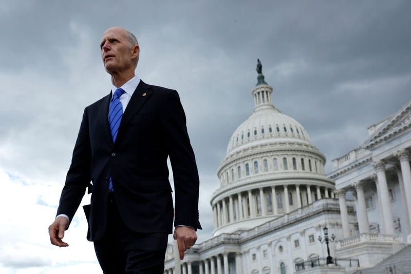 Sen. Rick Scott (R-FL) walks out of the U.S. Capitol for a news conference to urge the White House and Senate Democrats to pass the House GOP legislation that would raise the debt limit and cut federal spending on May 03, 2023 in Washington, DC. U.S.