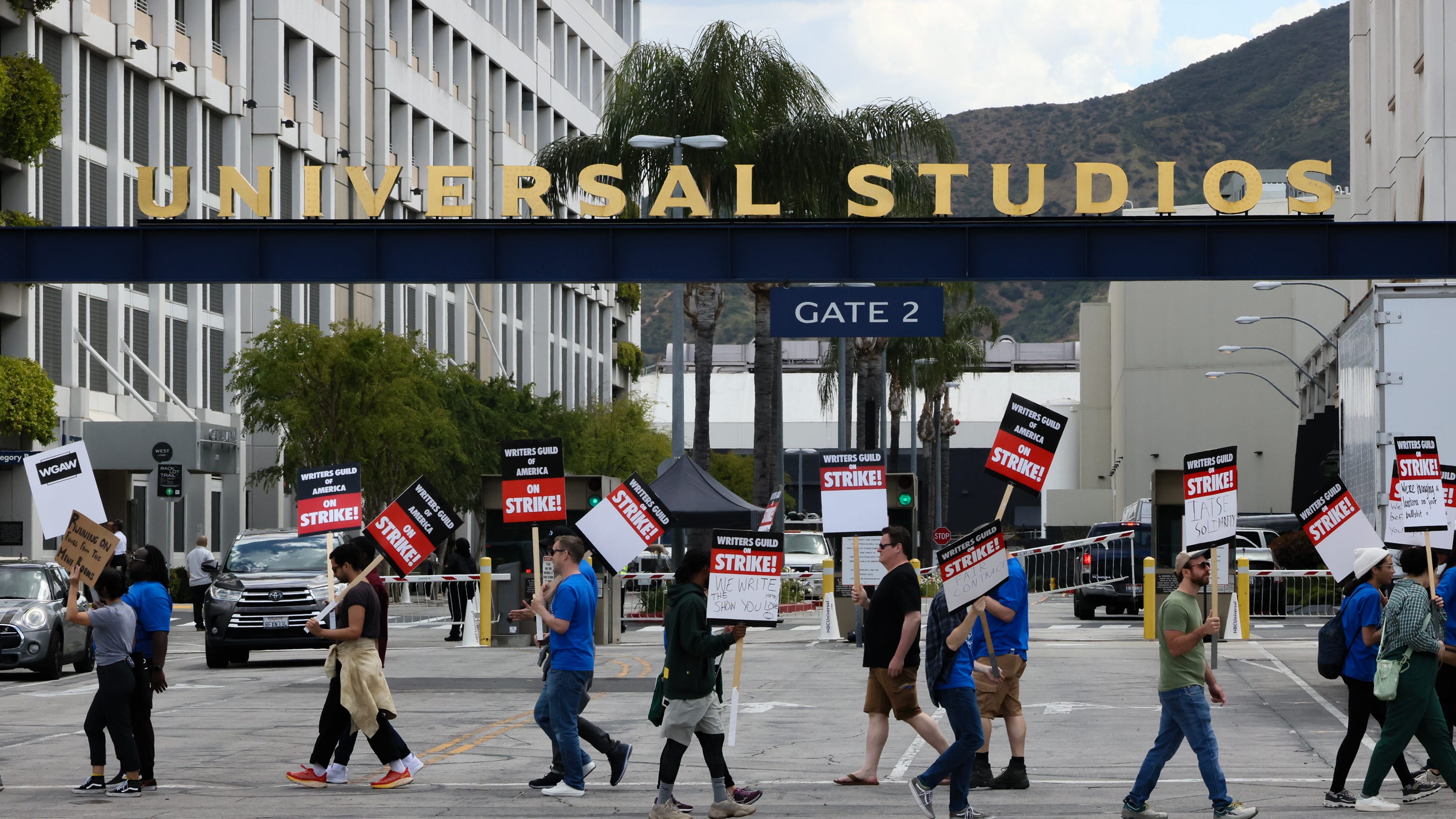 Striking writers, actors shut down street by Universal Studios