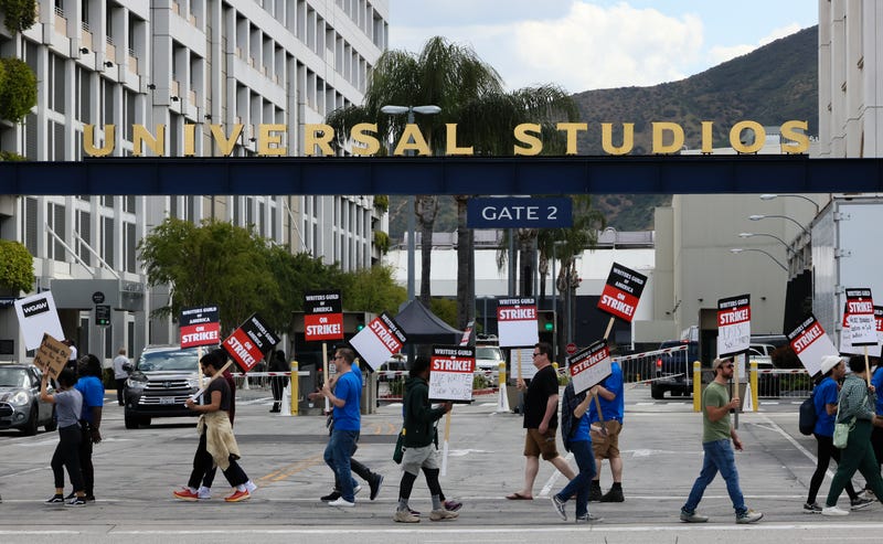 Striking writers, actors shut down street by Universal Studios amid labor stalemate