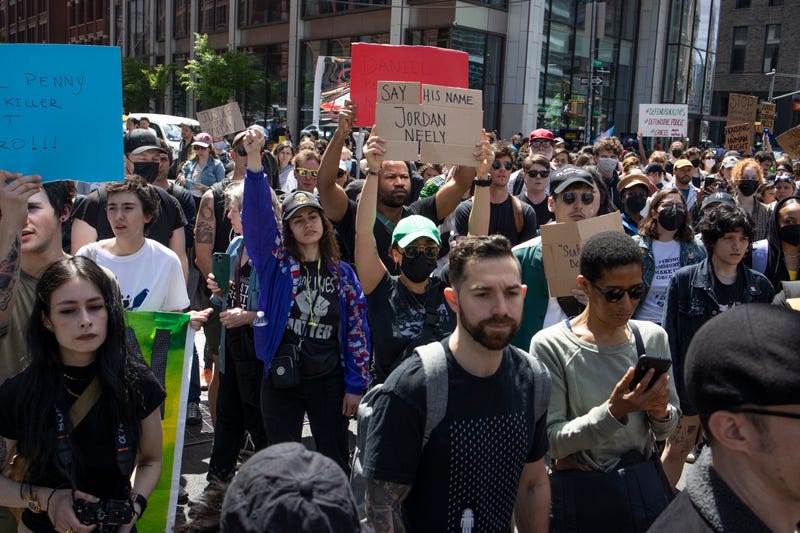 Black Lives Matter protestors march through the streets to demand justice for Jordan Neely on May 6, 2023