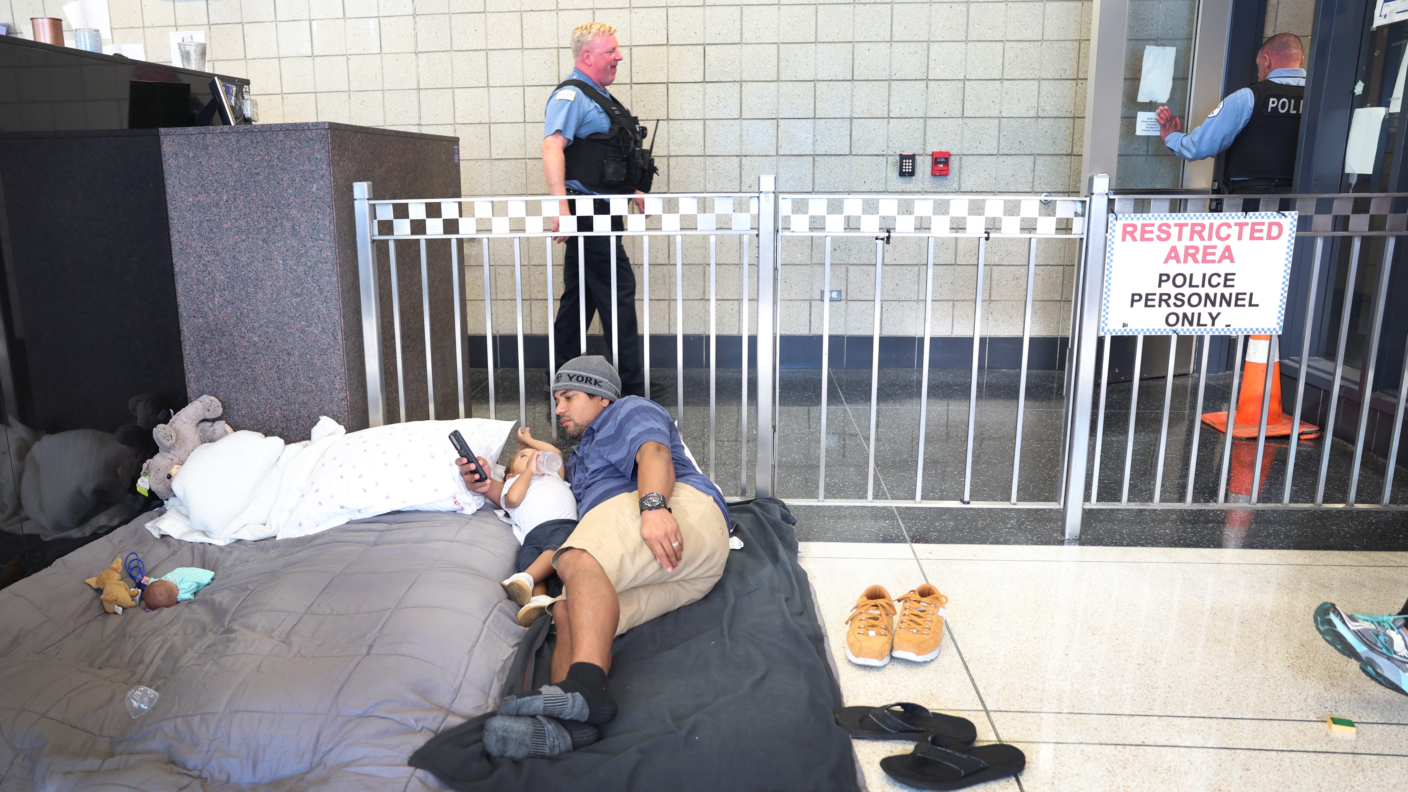 Moving migrants out of Chicago police stations, a complicated process, Johnson administration says
