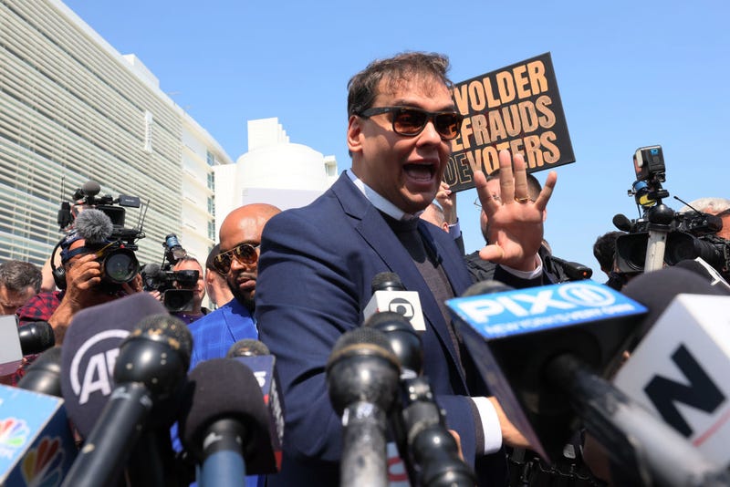 Rep. George Santos (R-NY) speaks with members of the press as he leaves Federal Court on May 10, 2023 in Central Islip, New York.