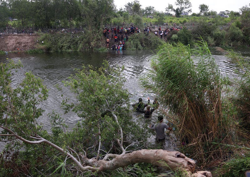 Migrants crossing the US/Mexico border