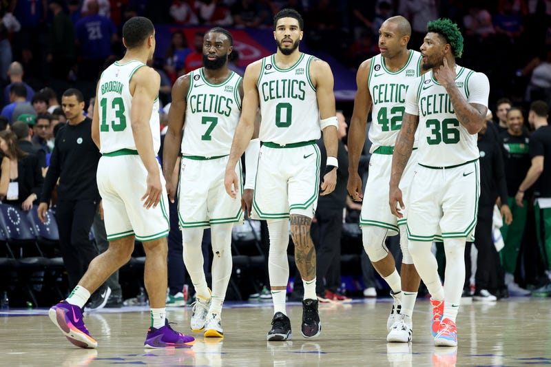 Malcolm Brogdon #13, Jaylen Brown #7, Jayson Tatum #0, Al Horford #42 and Marcus Smart #36 of the Boston Celtics talk against the Philadelphia 76ers during the fourth quarter in game six of the Eastern Conference Semifinals in the 2023 NBA Playoffs at Wells Fargo Center on May 11, 2023 in Philadelphia, Pennsylvania.