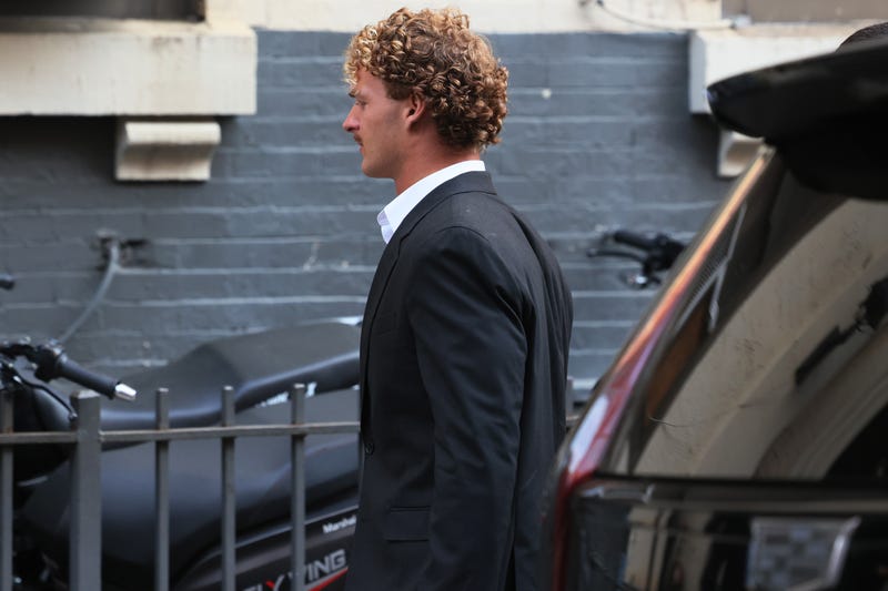 Daniel Penny walks into the 5th Precinct stationhouse on May 12, 2023