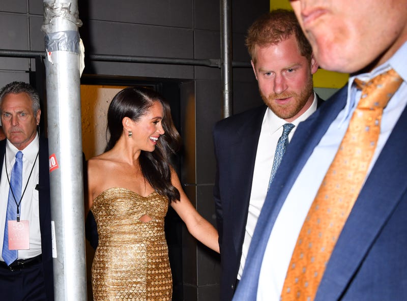 Meghan Markle, Duchess of Sussex, and Prince Harry, Duke of Sussex leave The Ziegfeld Theatre on May 16, 2023 in New York City. 