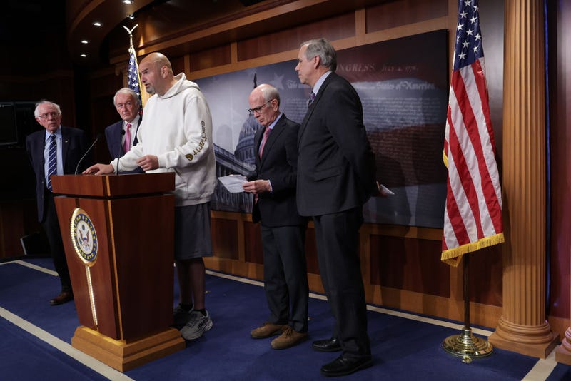 U.S. Sen. John Fetterman (D-PA) (3rd L) speaks as (L-R) Sen. Bernie Sanders (I-VT), Sen. Ed Markey (D-MA), Sen. Peter Welch (D-VT) and Sen. Jeff Merkley (D-OR) listen during a news conference on debt limit at the U.S. Capitol on May 18, 2023 in Washington, DC. 