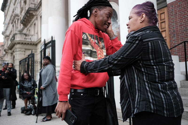 Larry Smith, Jordan Neely’s foster brother, is consoled as he arrives the funeral for Jordan Neely at Mount Neboh Baptist Church in Harlem on May 19, 2023
