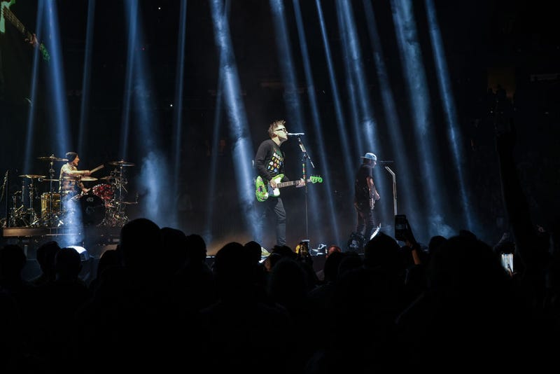 Travis Barker, Mark Hoppus and Tom DeLonge of Blink-182 perform onstage