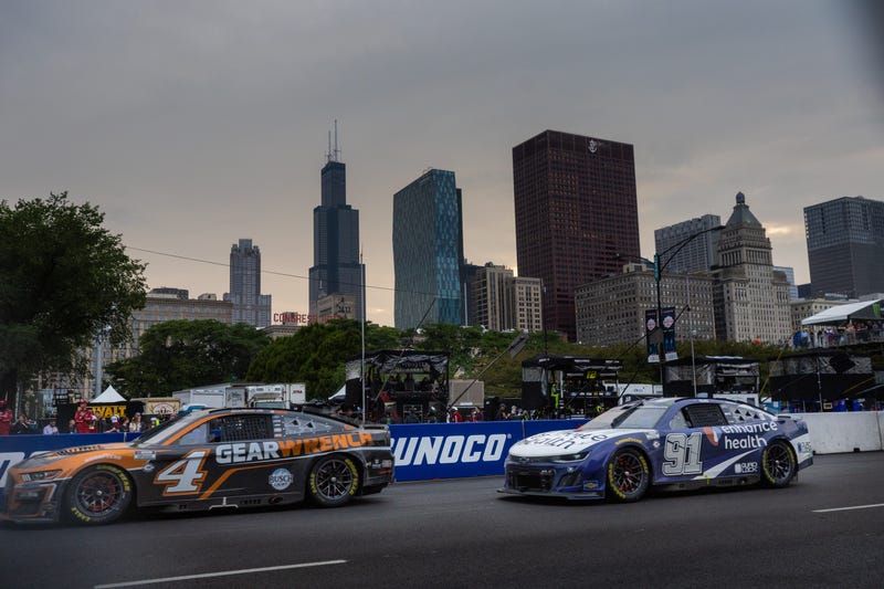 Shane van Gisbergen and Kevin Harvick compete during the NASCAR Chicago Street Race in Grant Park in Chicago, on July 2, 2023.