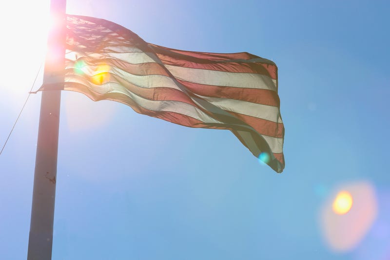 U.S. flag at half mast. 