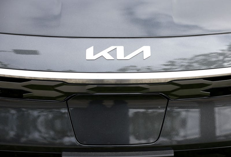 The Kia logo is displayed on a new car on the sales lot at San Leandro Kia on May 30, 2023 in San Leandro, California. 