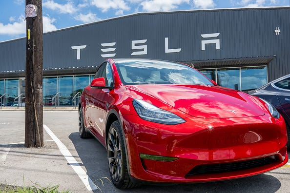 A Tesla Model Y is seen on a Tesla car