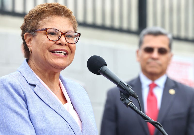Los Angeles Mayor Karen Bass (L) speaks as U.S. Health and Human Services Secretary Xavier Becerra looks on at a news conference following a tour and roundtable discussion at an Asian American Drug Abuse Program facility on May 31, 2023 in Los Angeles, California. 