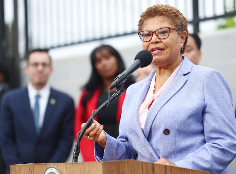 karen bass speaks at podium