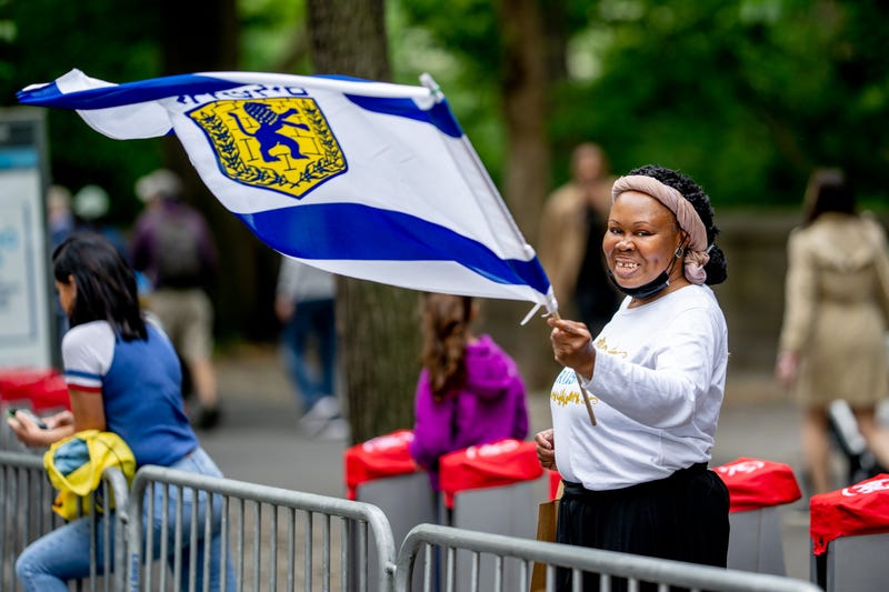 A member of the audience waves a flag with the Emblem of Jerusalem during the 2023 Celebrate Israel Parade on June 04, 2023 in New York City.