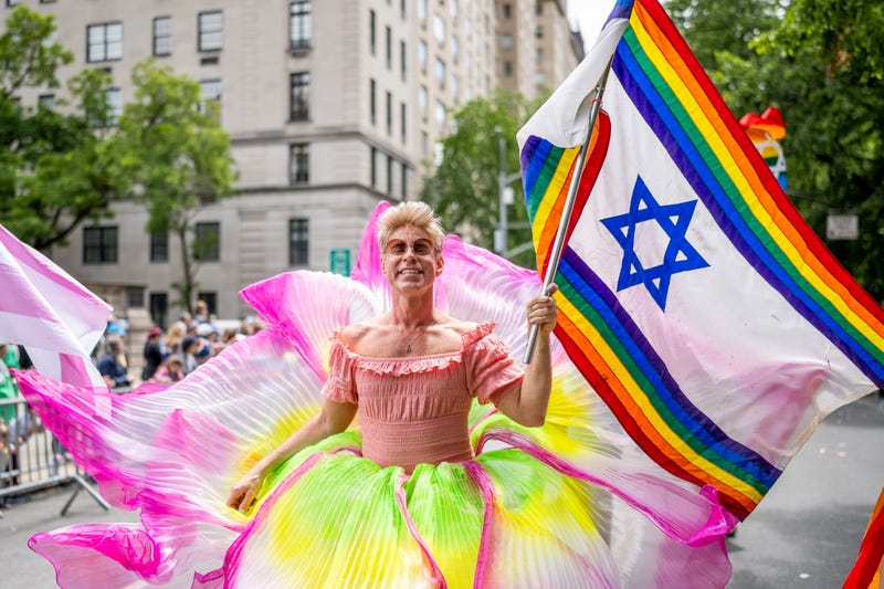 A Parade participant waves an Israeli flag in support of the Israeli LGBTQ+ community during the 2023 Celebrate Israel Parade on June 04, 2023 in New York City.