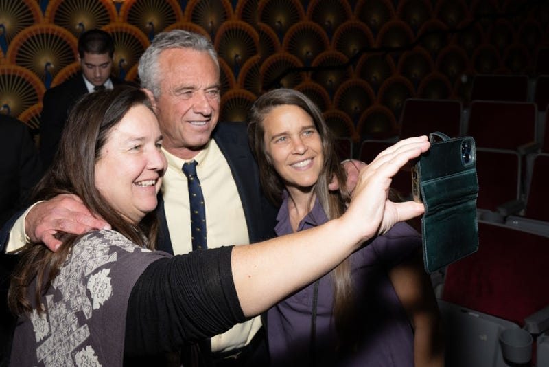 JUNE 05: Robert F. Kennedy, Jr. takes a selfie with guests during the Michael Smerconish SiriusXM Town Hall live broadcast at The Centre Theater on June 05, 2023 in Philadelphia, Pennsylvania. (Photo by Lisa Lake/Getty Images for SiriusXM)