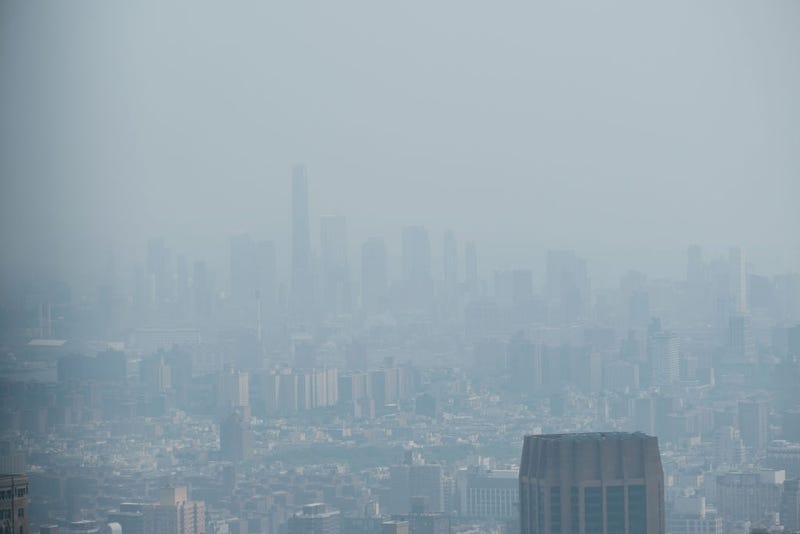 Manhattan is enveloped in a dense haze caused by wildfires in Canada on June 06, 2023 in New York City.