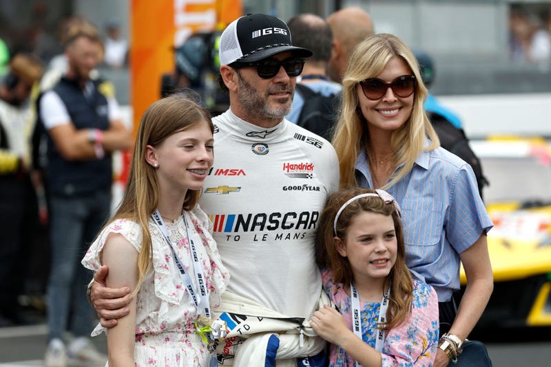 Jimmie Johnson of the #24 NASCAR Next Gen Chevrolet ZL1 looks on with his family during the 100th anniversary of the 24 Hours of Le Mans at the Circuit de la Sarthe June 10, 2023 in Le Mans, France. (Photo by Chris Graythen/Getty Images)