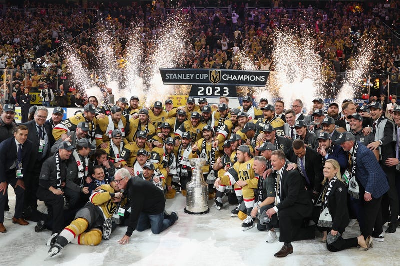 The Vegas Golden Knights pose with the Stanley Cup following their victory over the Florida Panthers in Game Five of the 2023 NHL Stanley Cup Final at T-Mobile Arena on June 13, 2023
