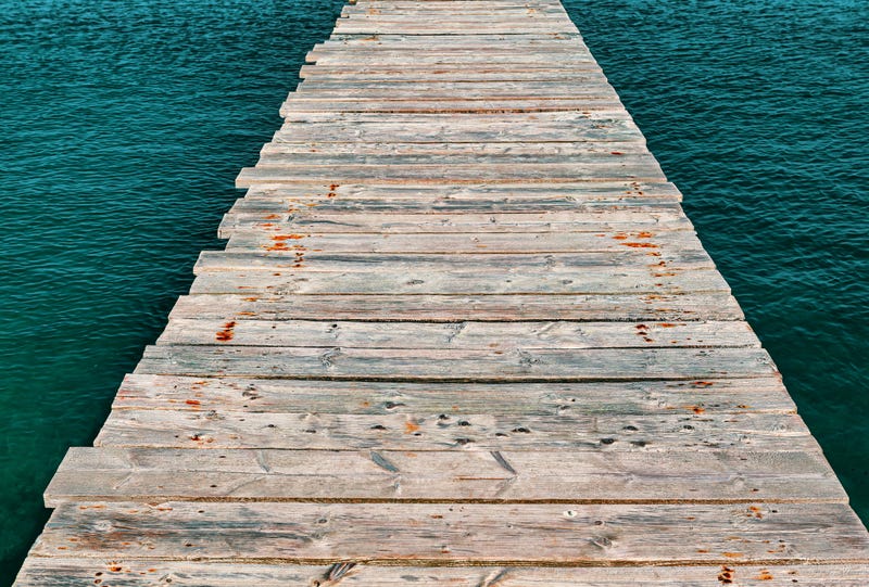 Wooden pier over a lake. 
