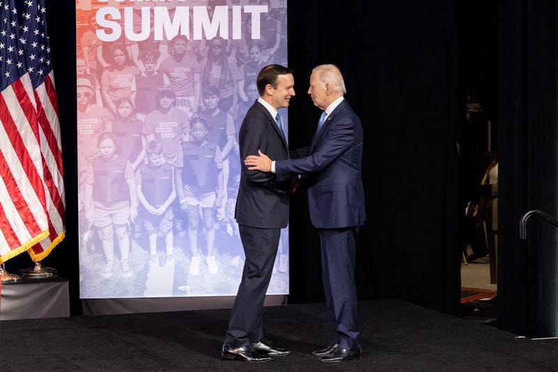 U.S. President Joe Biden is greeted by Sen. Chris Murphy (D-CT) before speaking at the National Safer Communities Summit at the University of Hartford on June 16, 2023 in West Hartford.
