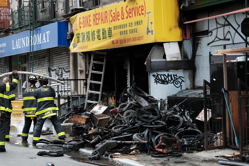 A fire at an e-bike shop killed four people and critically injured two women on Madison Street on June 20