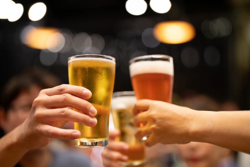 People toasting at a happy hour