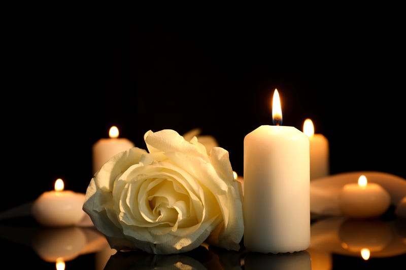 White candle and flower