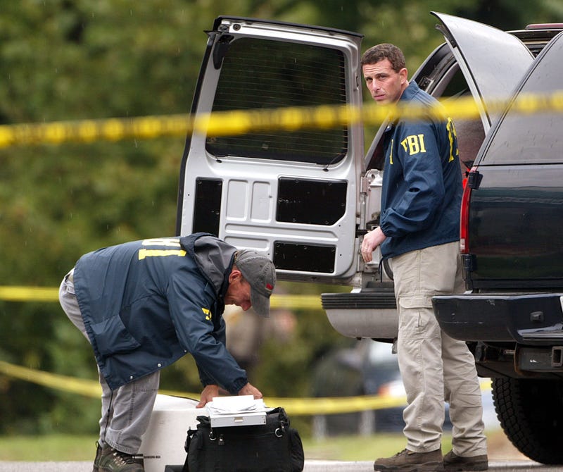 A suspect is in custody following a Wednesday morning robbery and shooting outside a Chase Bank branch in Balch Springs, where an armored car employee was critically injured while handling cash at an ATM lane