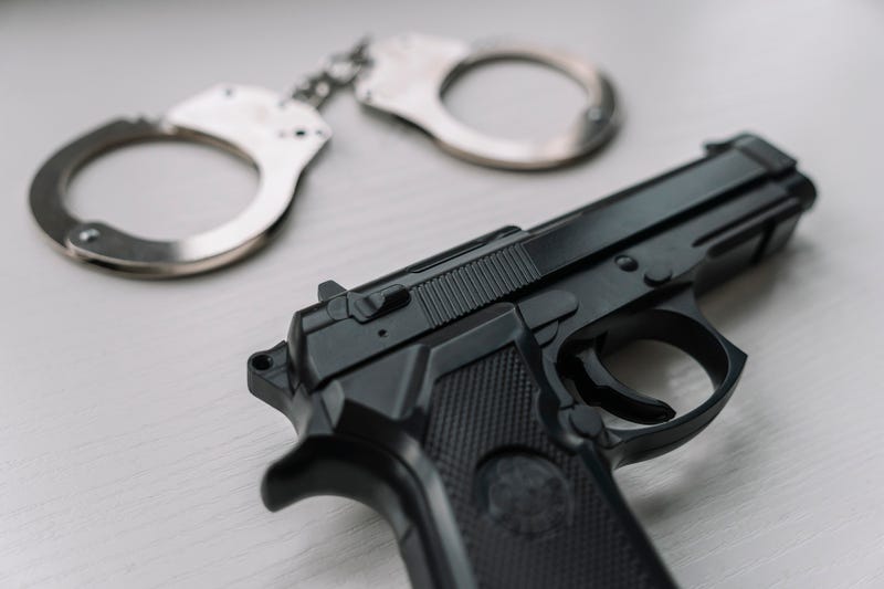 gun, arrested