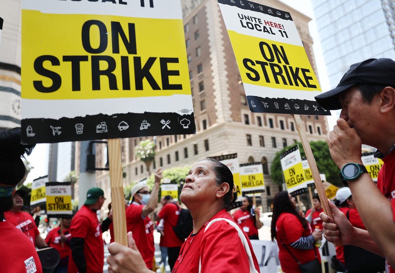 workers with picket signs